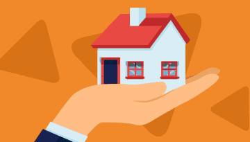 hand holding a house