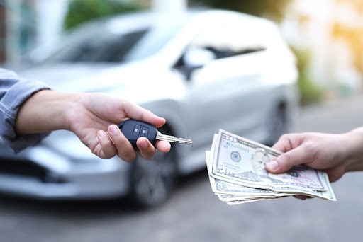 Exchange money and car keys Car Trading and Loan